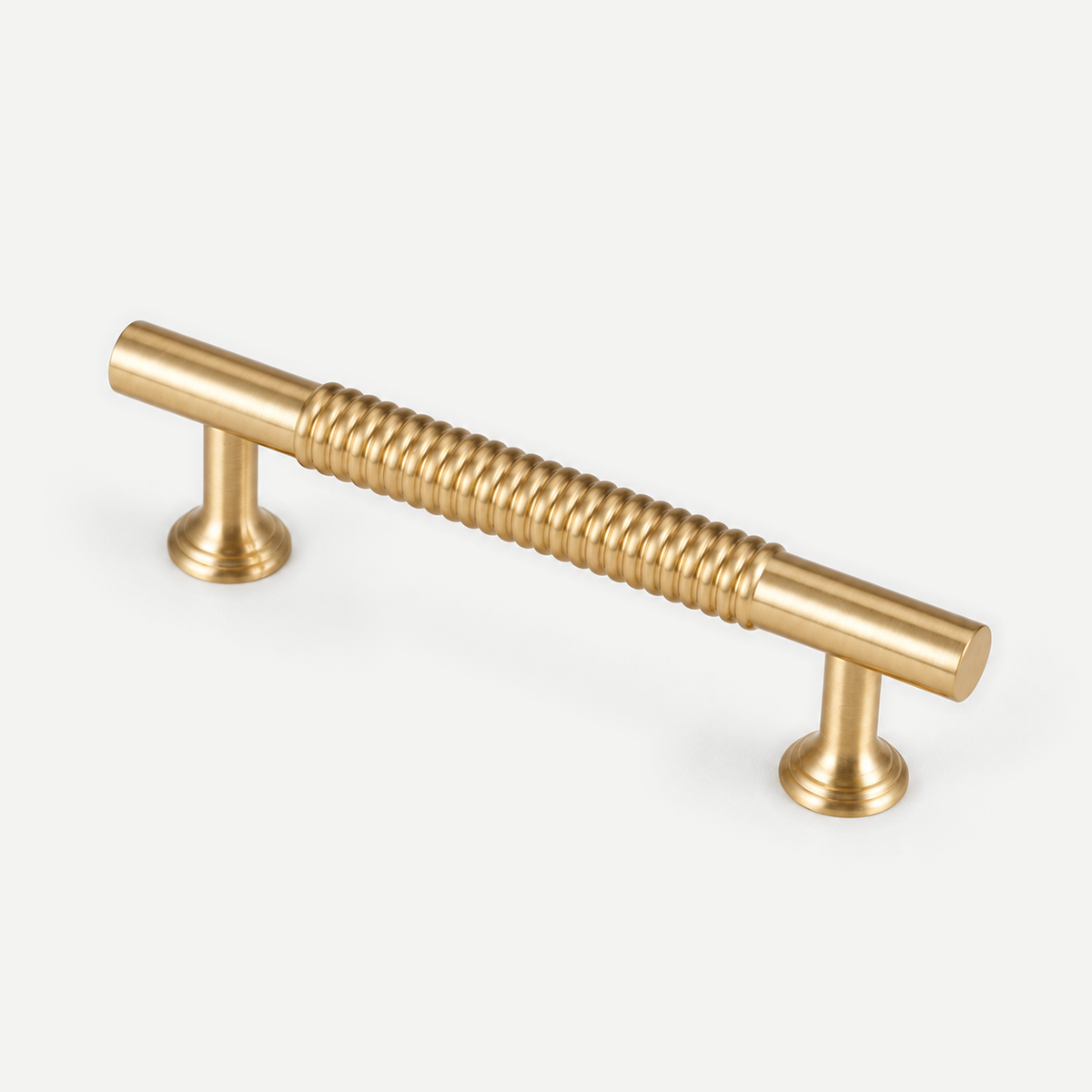 Anti-slip textured brass cabinet handle — diagonal view of genuine ringed grip and two bell-shaped feet