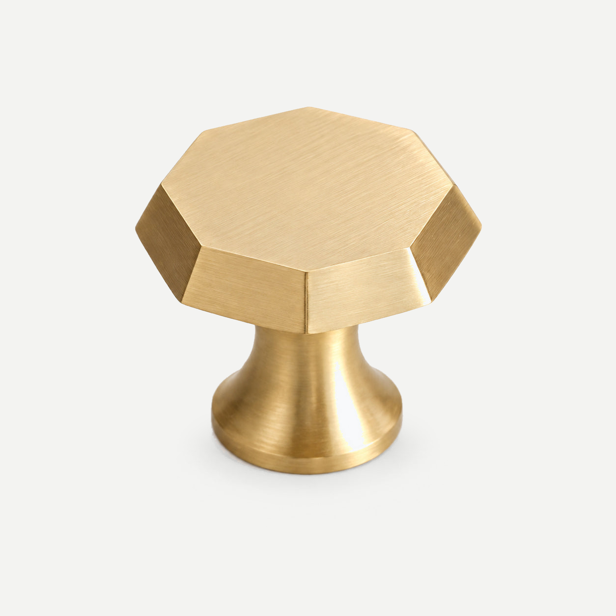 Octagonal brushed brass cabinet knob - single item background corrected