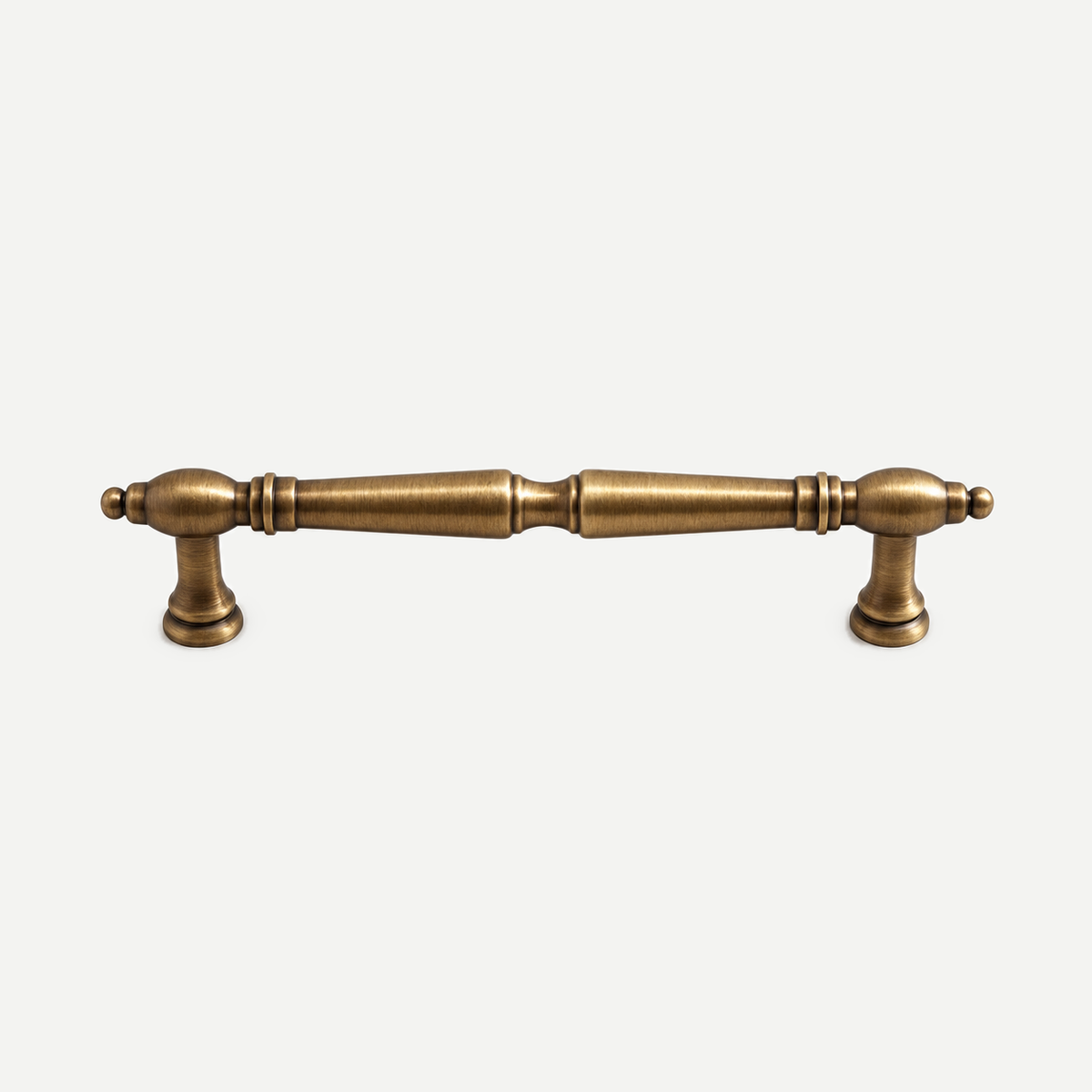 Antique brass spindle handle - 128mm hole centres, 162mm overall length