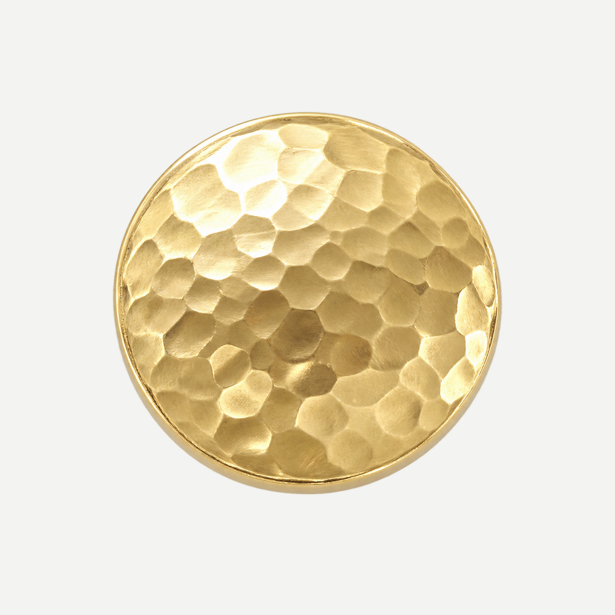 Hammered flat round brass knob - overhead face detail