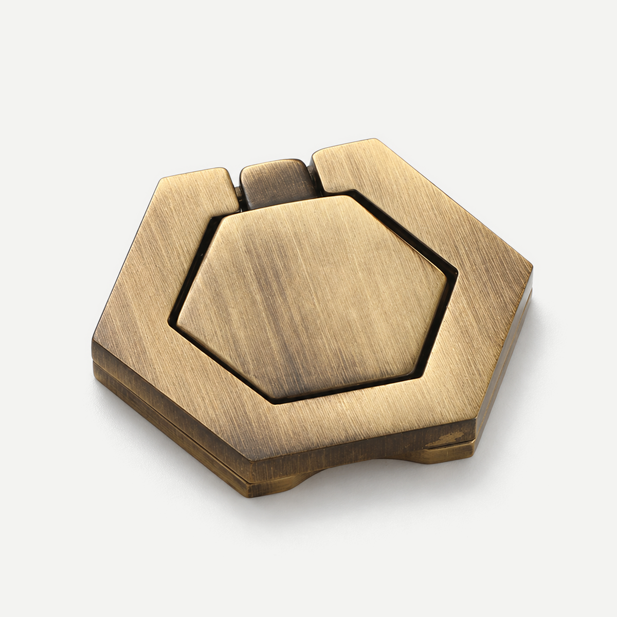 Antique brass hexagonal fold-down pull - source-faithful angled single photograph