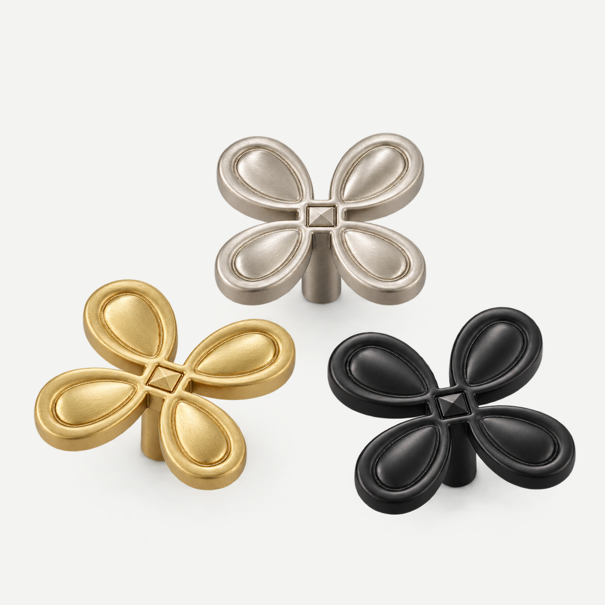 Gold brushedsilver black four-petal cabinet knobs - finish assortment