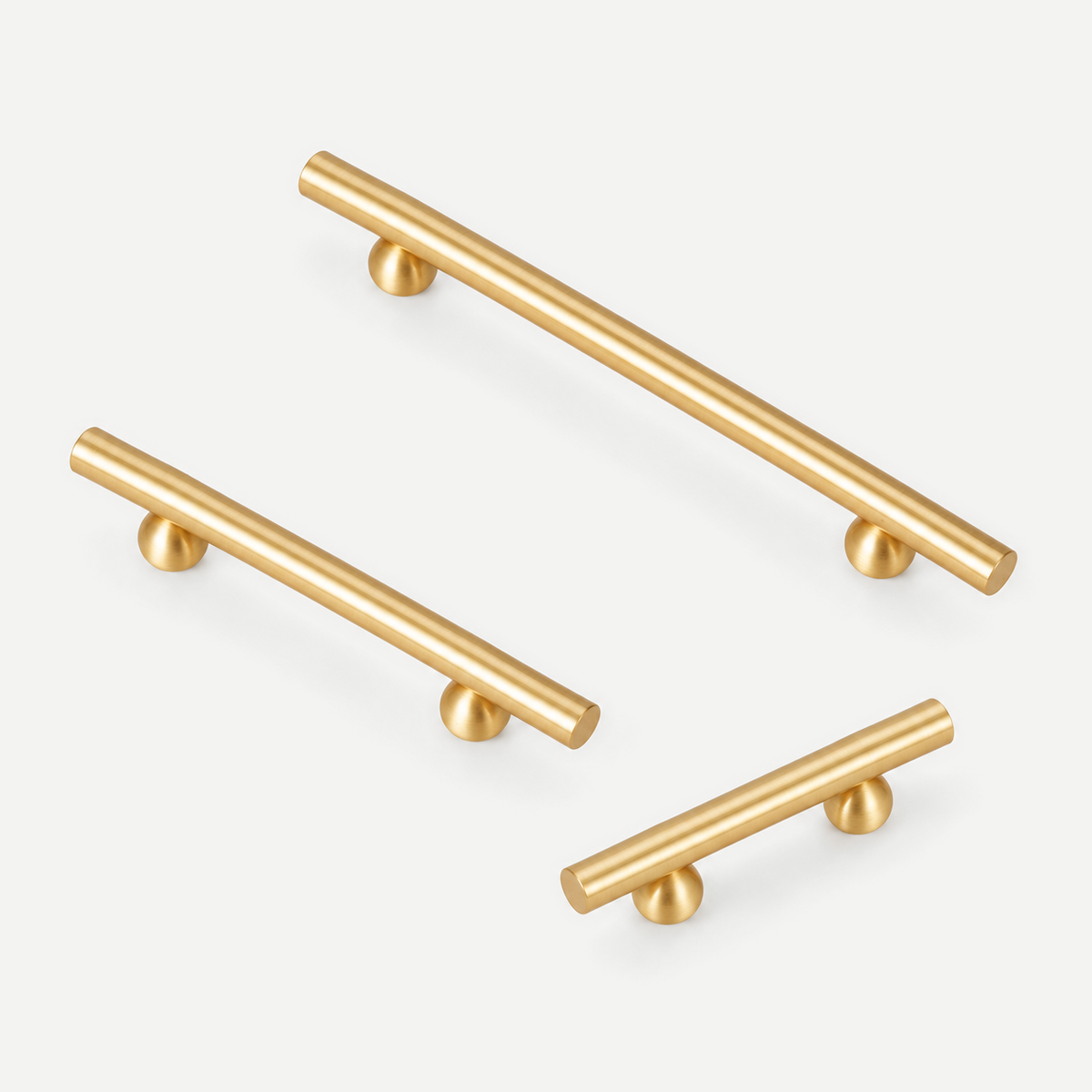 Brushed brass smooth bar cabinet handles with rounded feet — representative 64, 128 and 192mm sizes